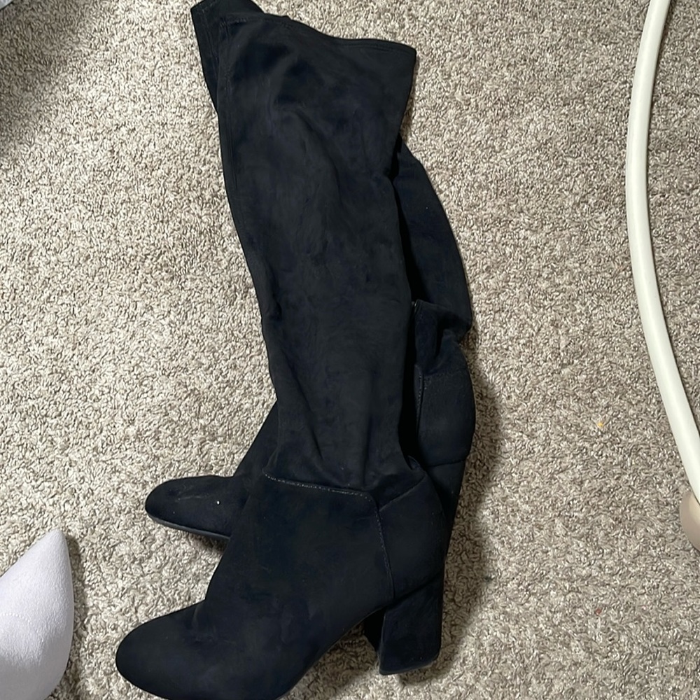 Tall black thigh boots